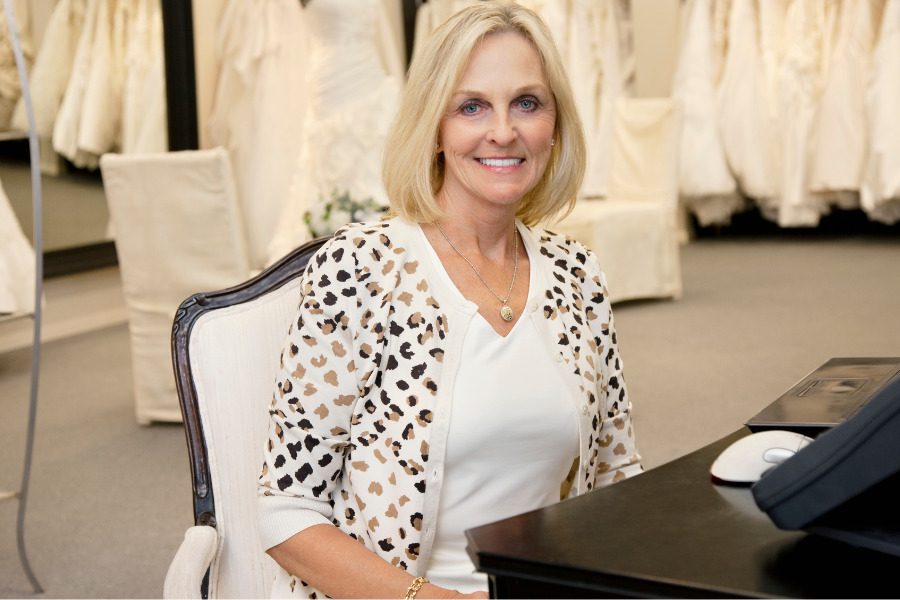 bridal store employee at desk